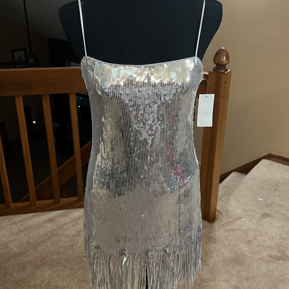 Silver cocktail dress with fringe. Spaghetti straps. New with tags